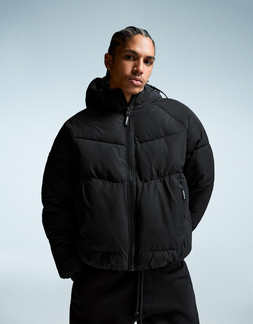 BLOUSON BOUFFANT À CAPUCHE