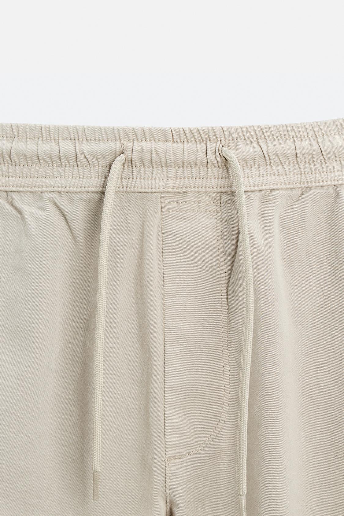 PANTALON DÉLAVÉ AVEC TAILLE JOGGING