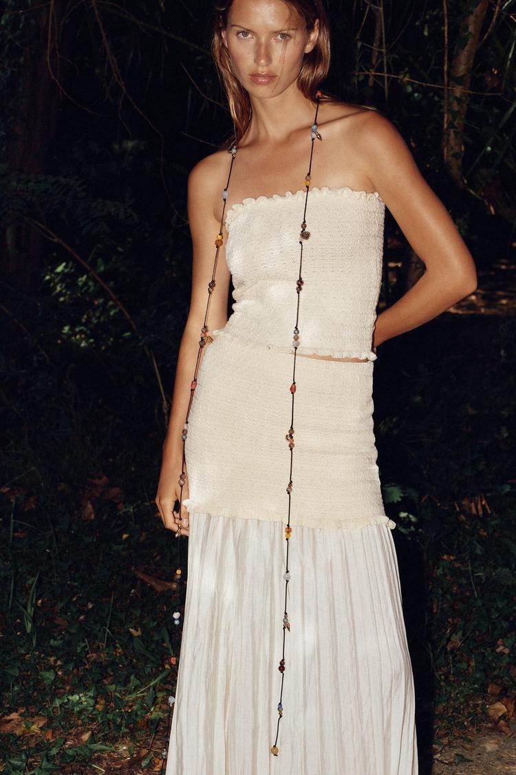 JUPE EN MAILLE EN MATIÈRES VARIÉES