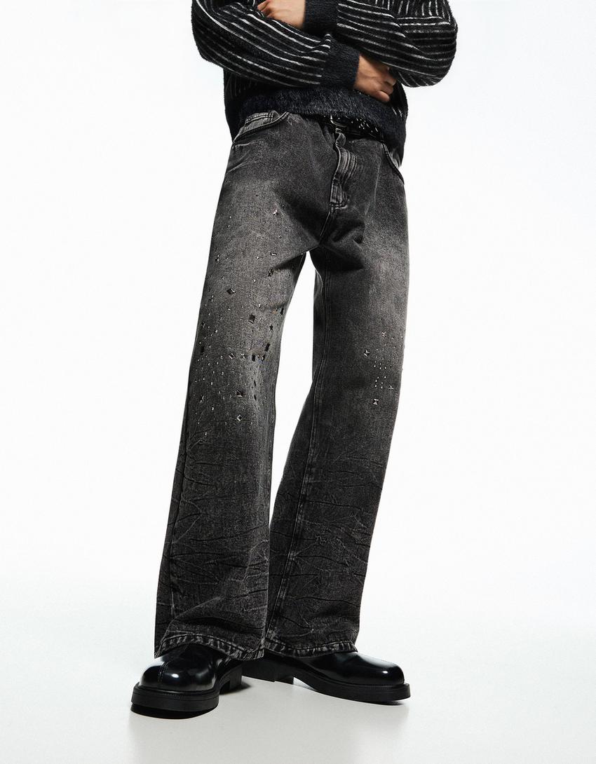 PANTALON FLARE À CLOUS