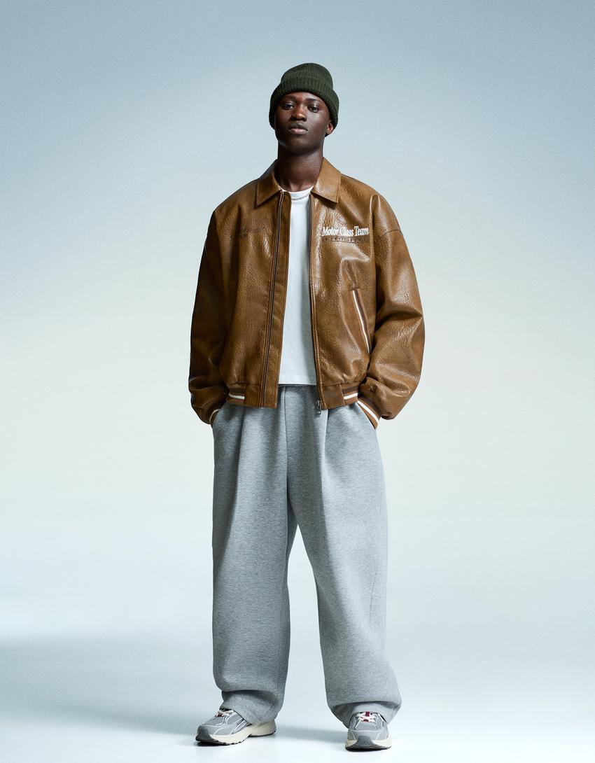 VESTE EN SIMILICUIR BRODÉ