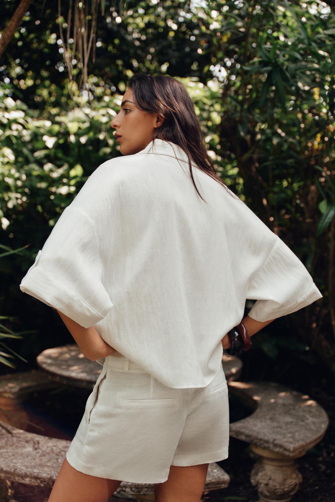 CHEMISE MANCHES COURTES LARGES