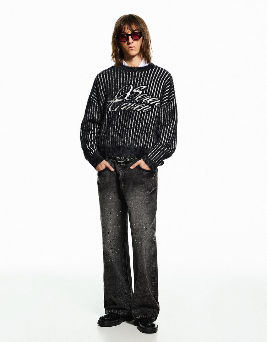 PANTALON FLARE À CLOUS