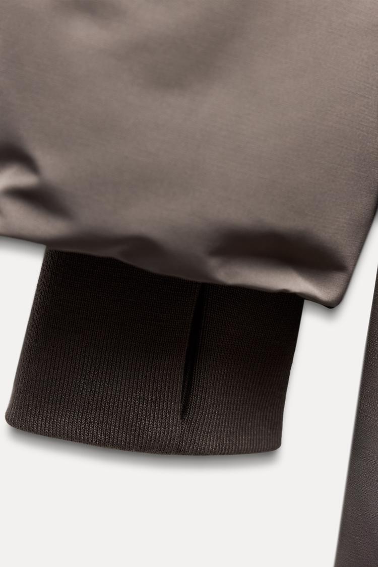 Doudoune longue verte à capuche imperméable  et coupe vent - Vison