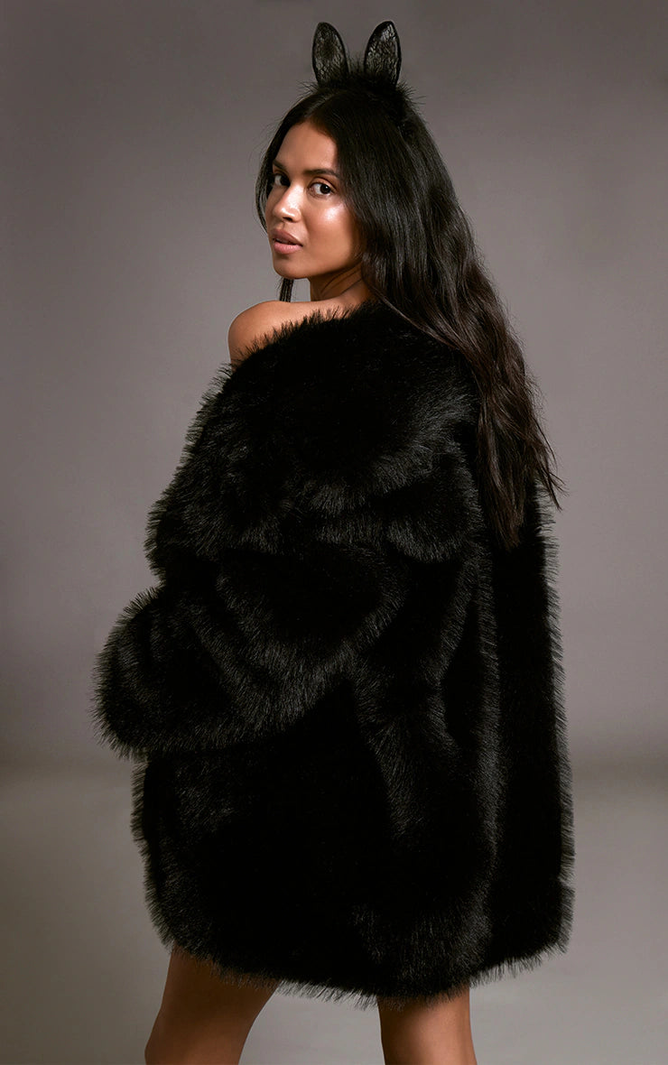 MANTEAU MI-LONG OVERSIZE EN FAUSSE FOURRURE