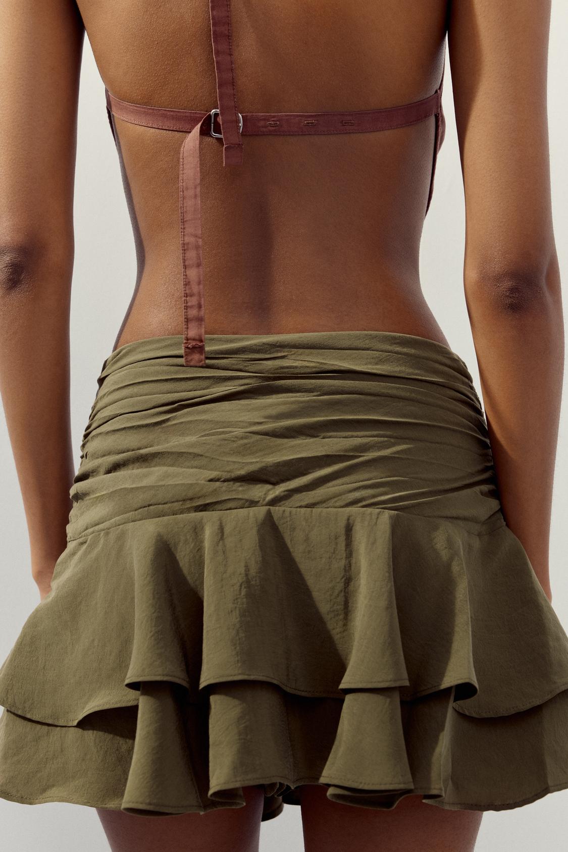 JUPE-CULOTTE À VOLANTS