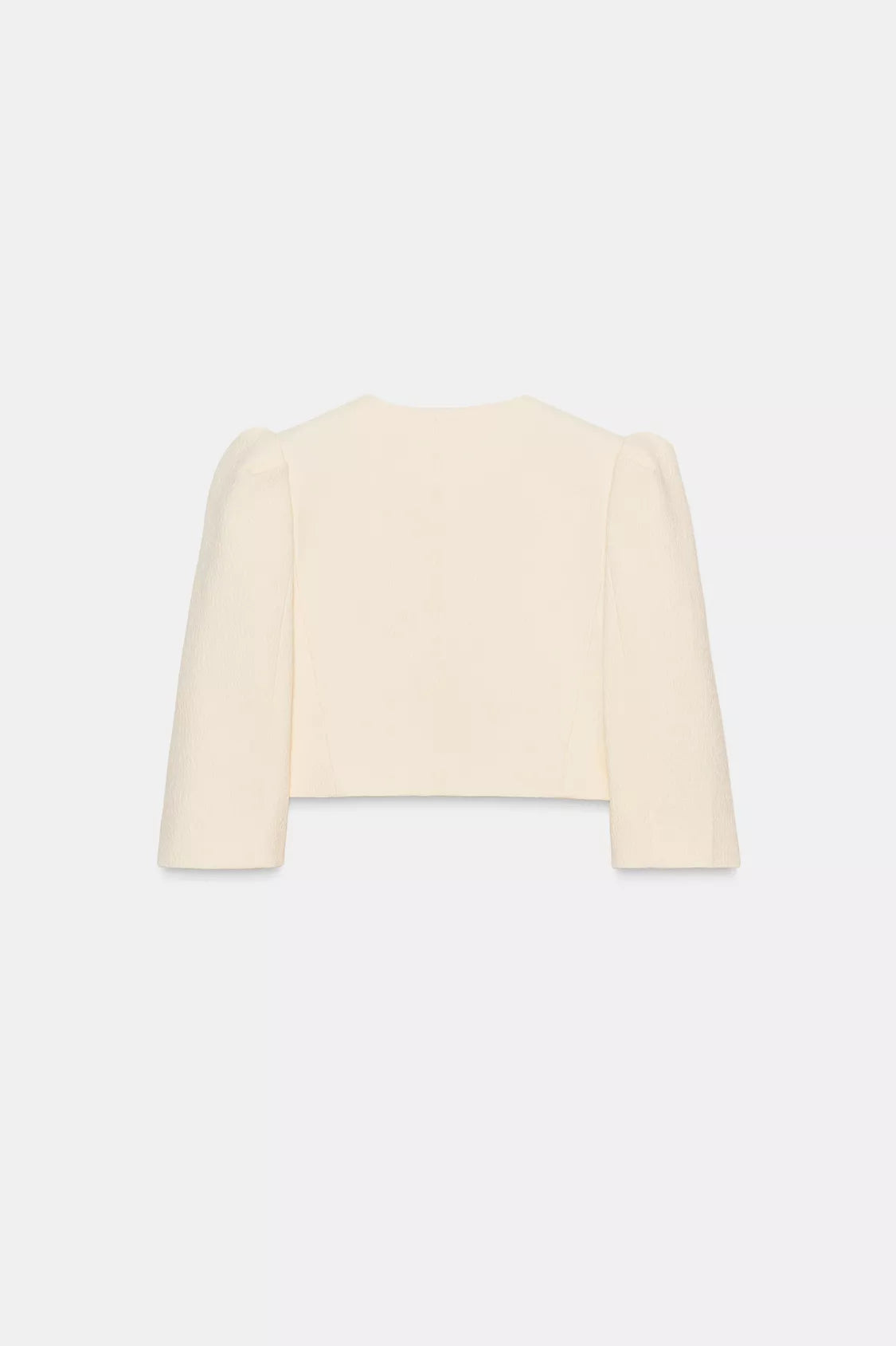 VESTE COURTE À MANCHES BOUFFANTES