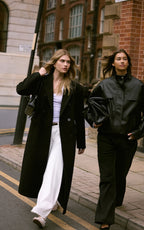 MANTEAU STRUCTURÉ OVERSIZE NOIR À DOUBLE BOUTONNIÈRE