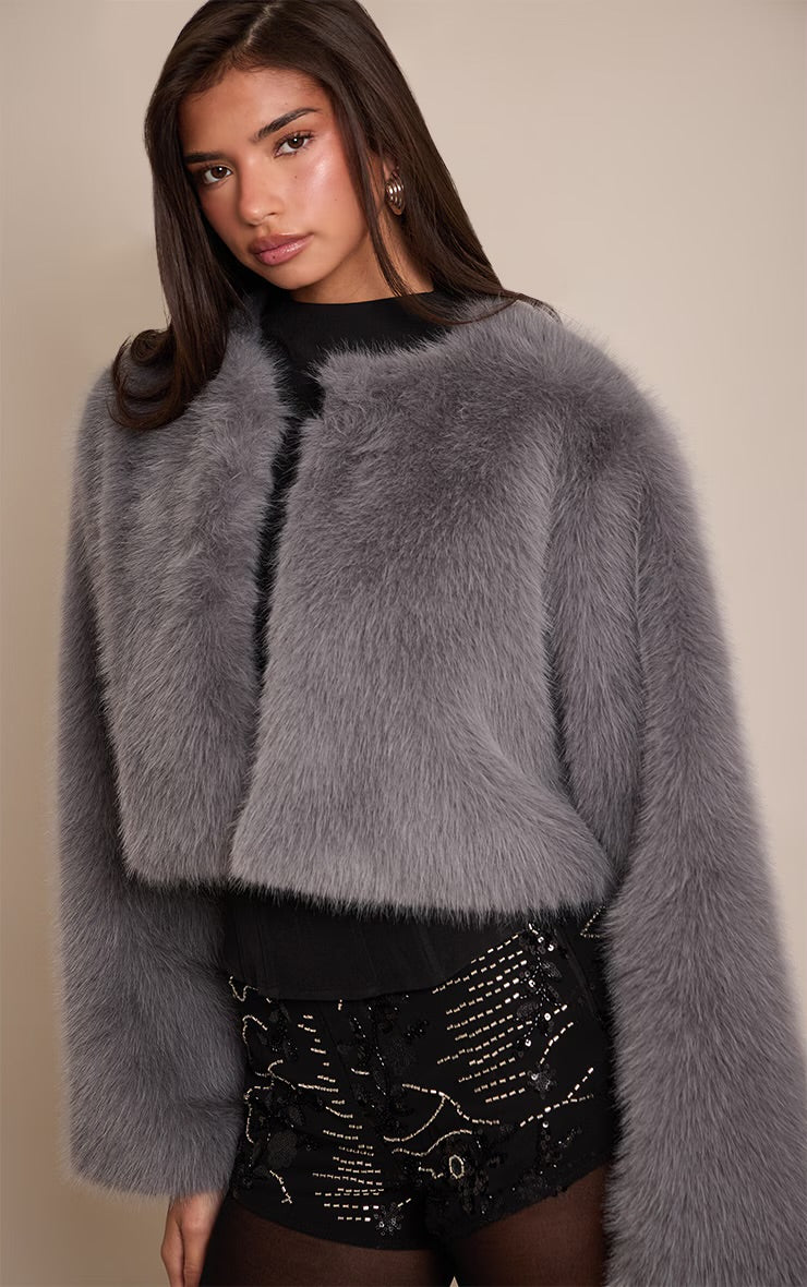 MANTEAU COURT EN FAUSSE FOURRURE