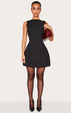 PETITE MINI ROBE TISSÉE NOIRE À DOS NU