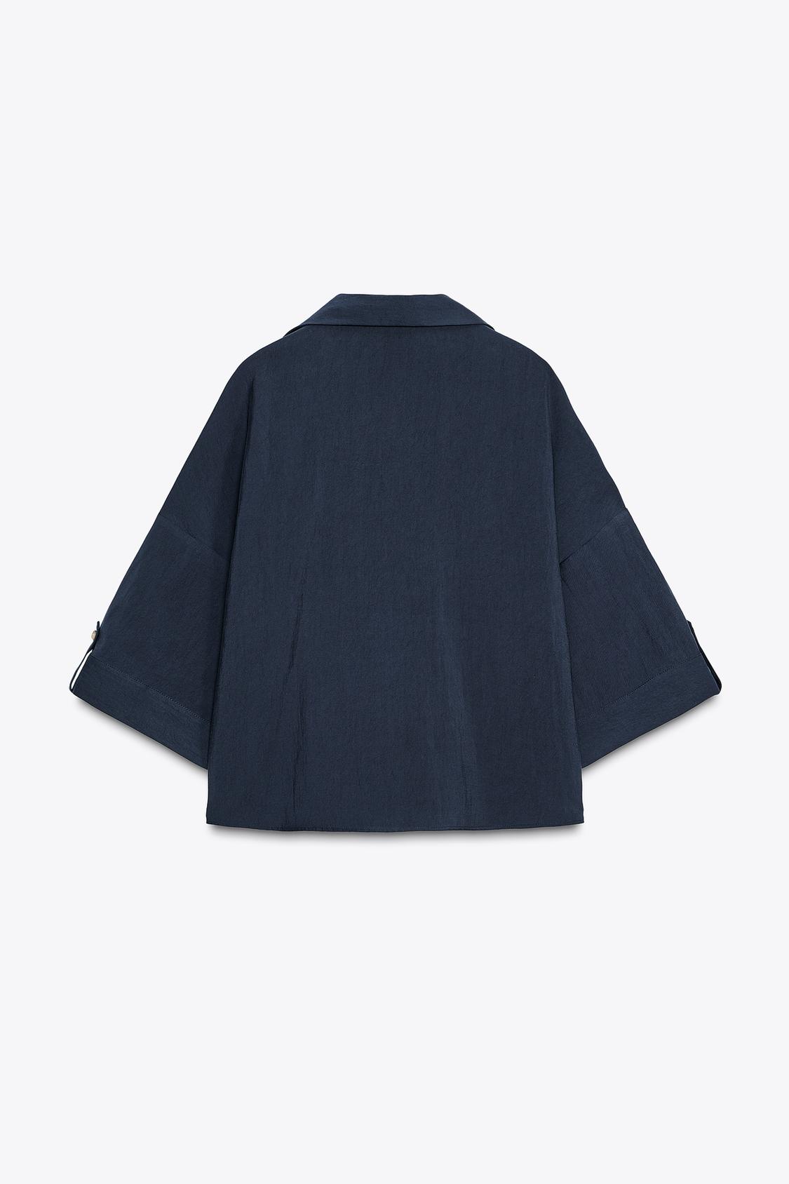 CHEMISE MANCHES COURTES LARGES