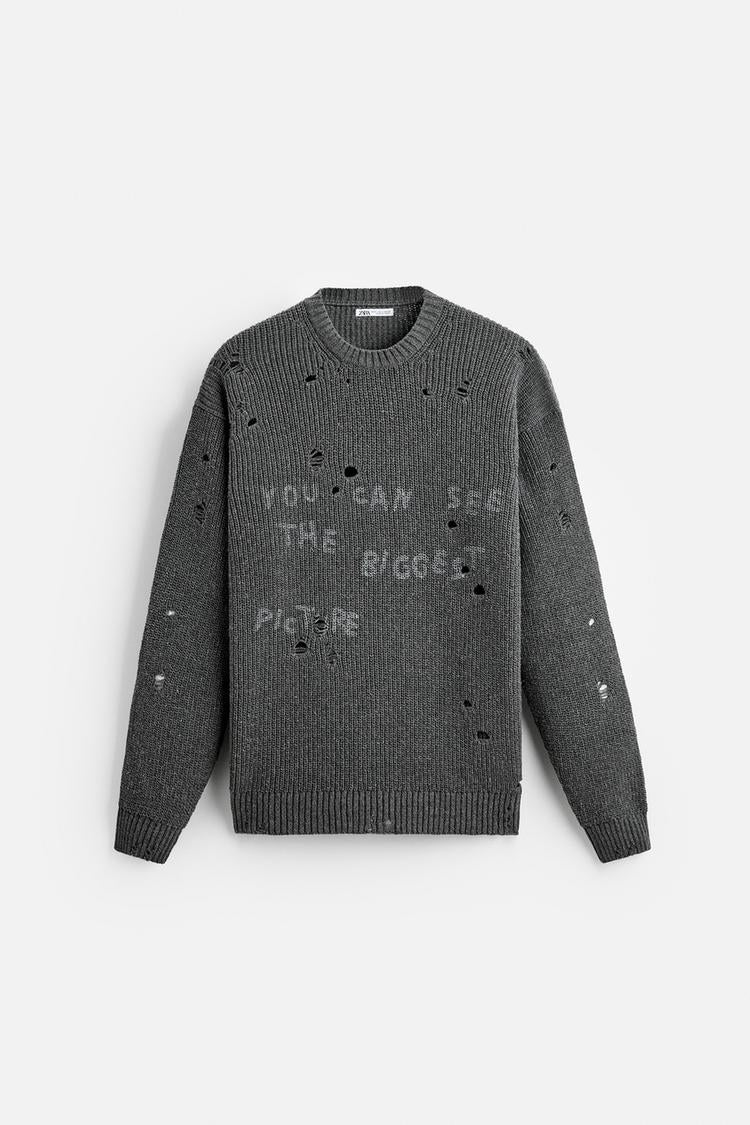 Pull effet déchiré imprimé