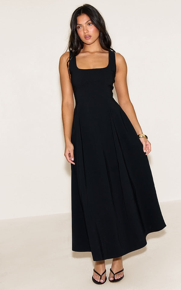 ROBE LONGUE NOIRE SANS MANCHES À COL ROND