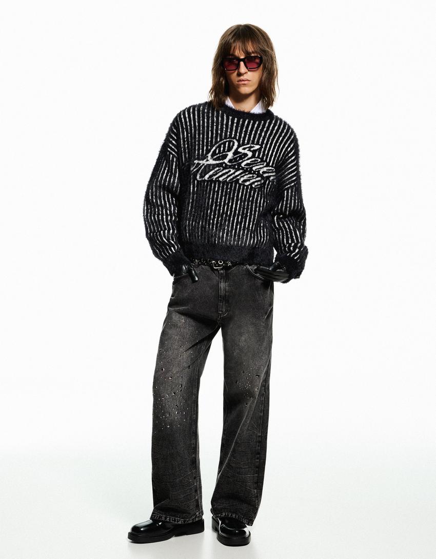 PANTALON FLARE À CLOUS