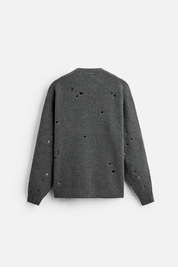 Pull effet déchiré imprimé