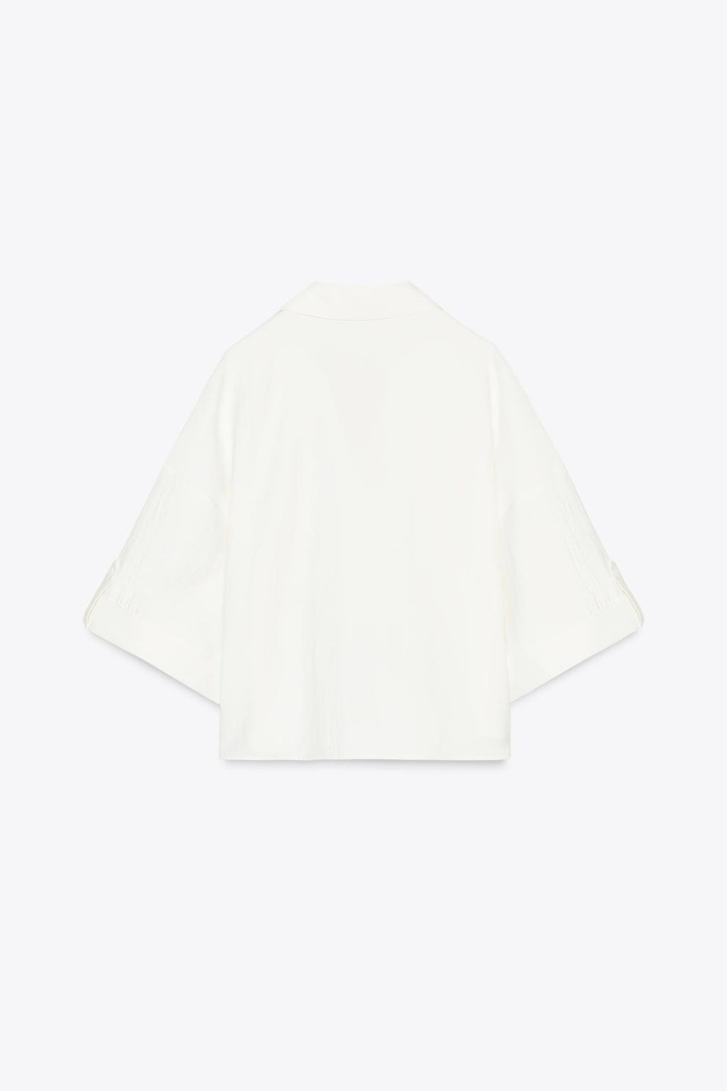 CHEMISE MANCHES COURTES LARGES