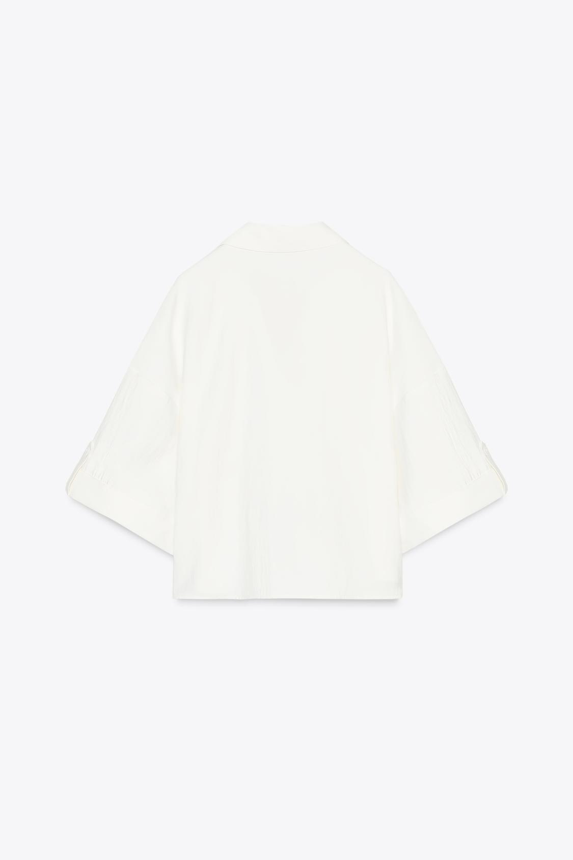 CHEMISE MANCHES COURTES LARGES