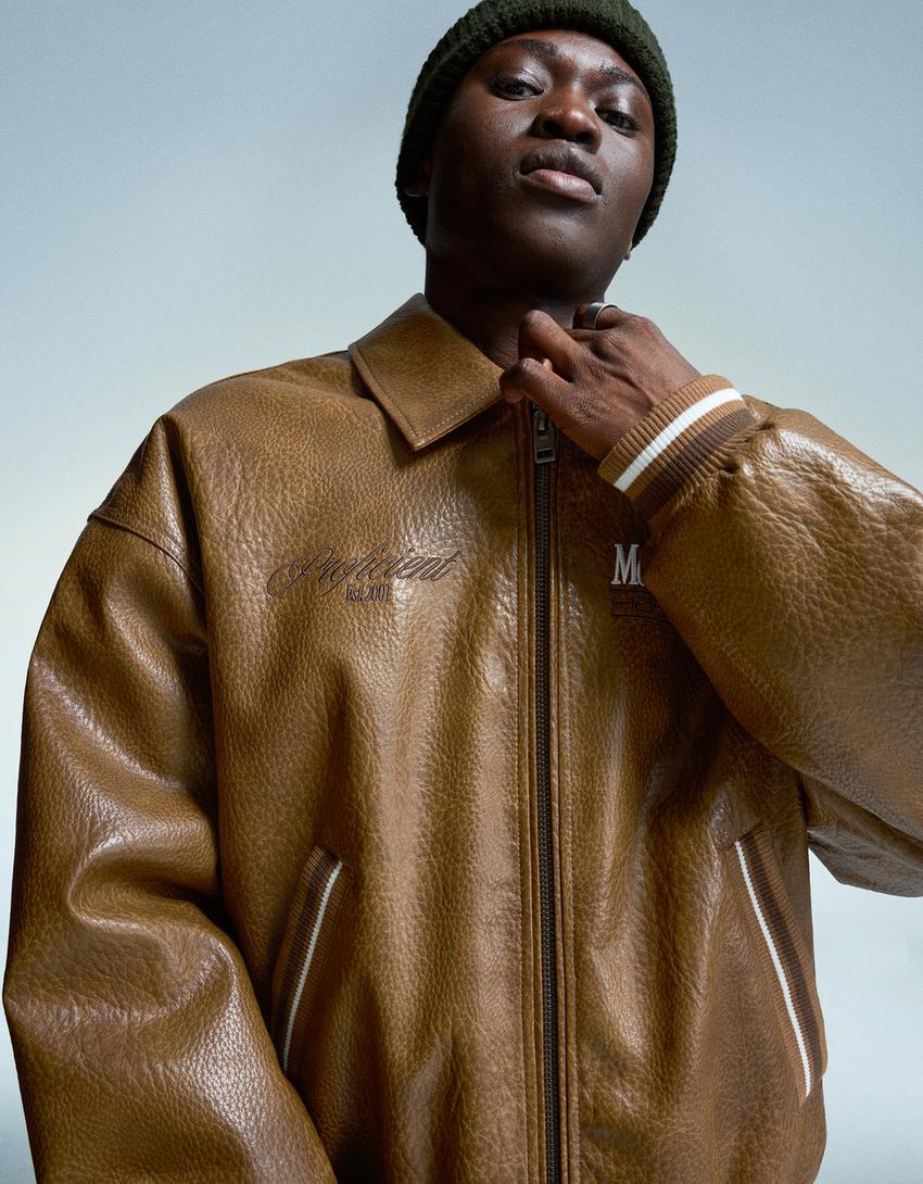 VESTE EN SIMILICUIR BRODÉ