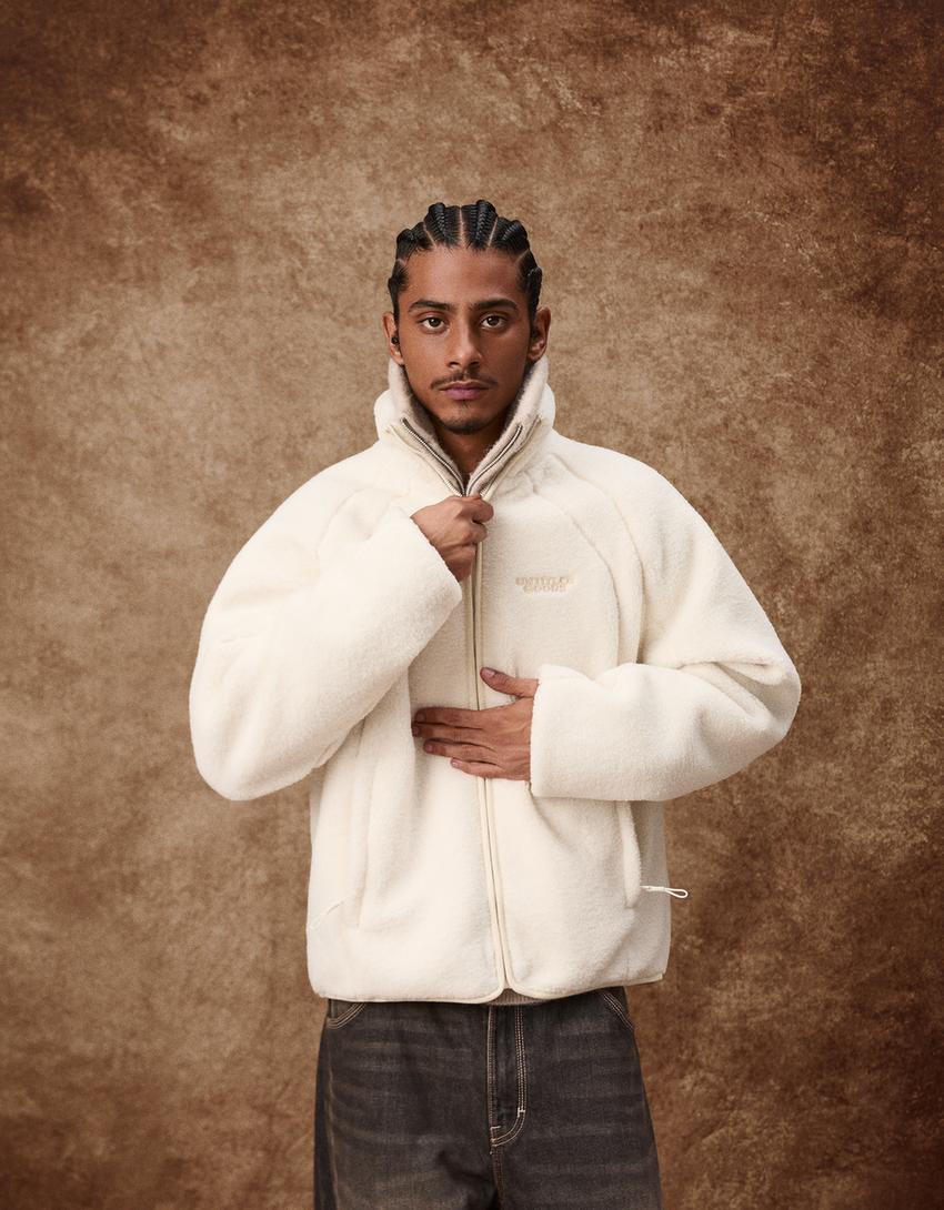 VESTE EN MOUTON SYNTHÉTIQUE