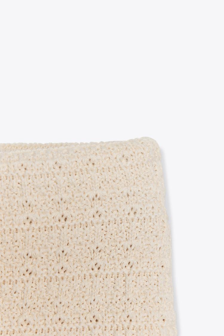 JUPE EN MAILLE EN MATIÈRES VARIÉES