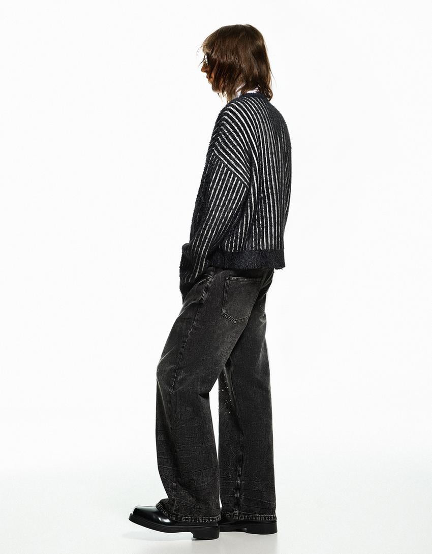 PANTALON FLARE À CLOUS