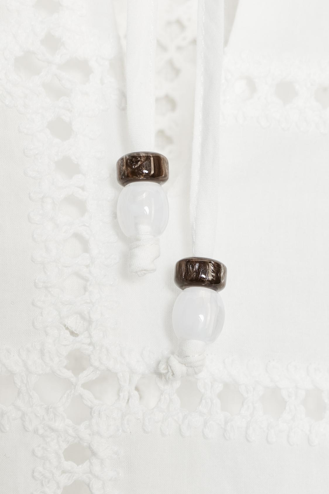 BLOUSE COURTE BRODÉE ET PERFORÉE