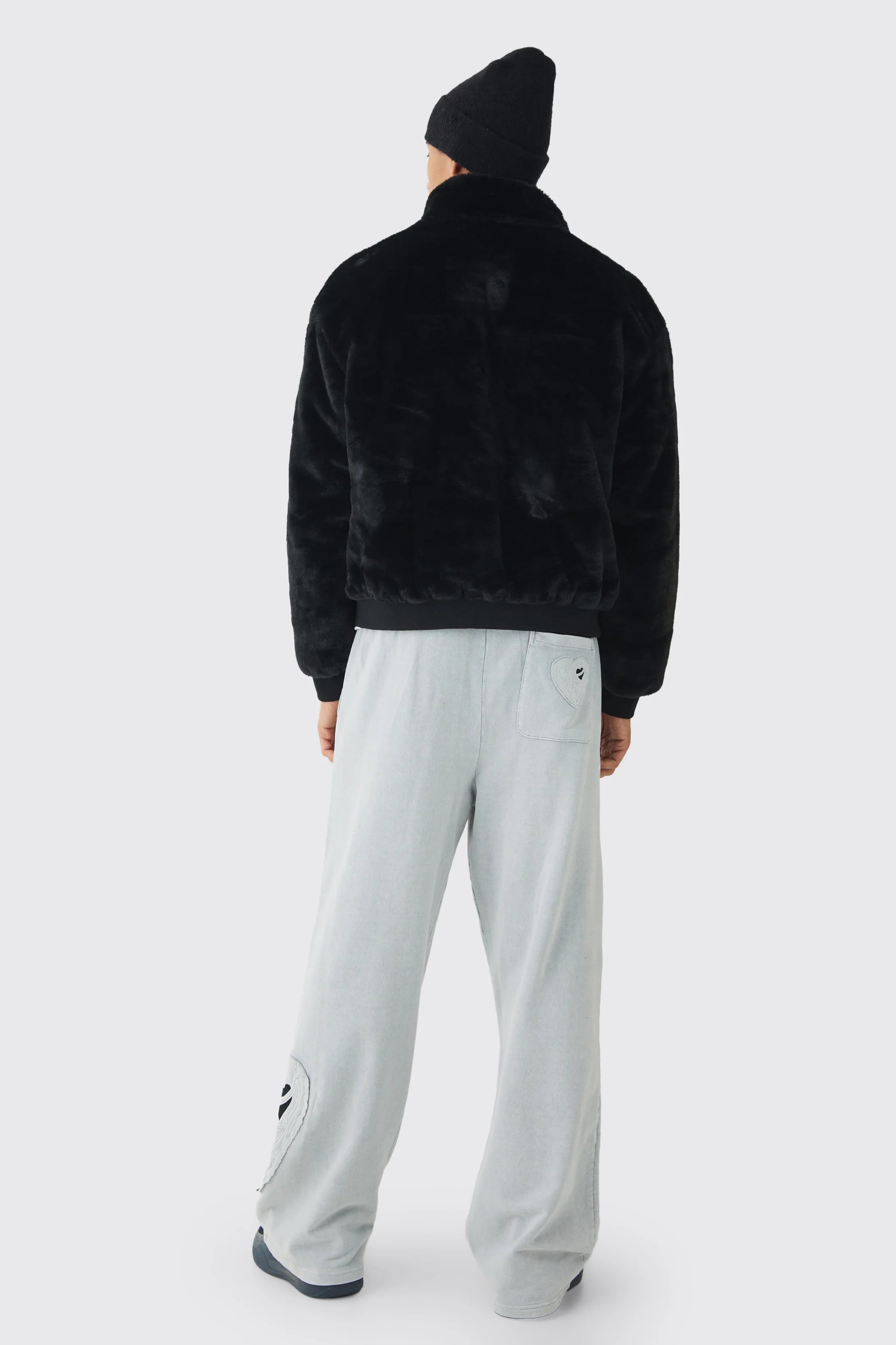 BOMBER EN SYNTHÉTIQUE À COL CHEMINÉE