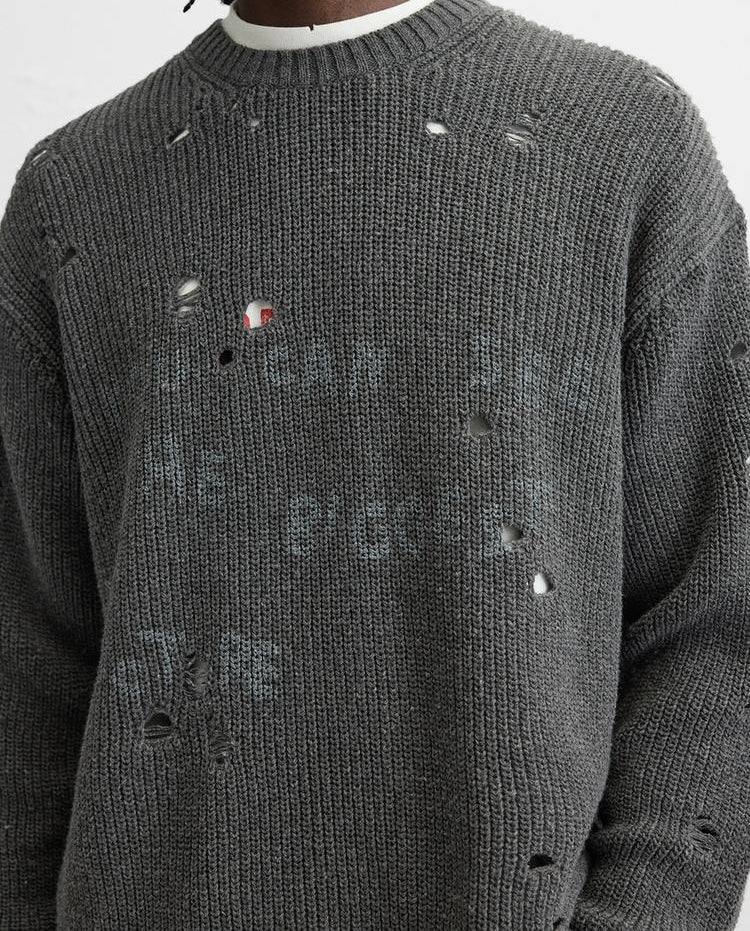 Pull effet déchiré imprimé