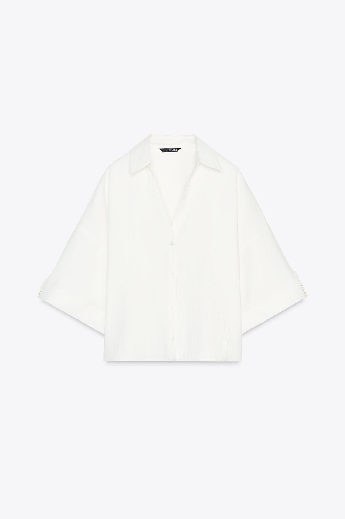 CHEMISE MANCHES COURTES LARGES