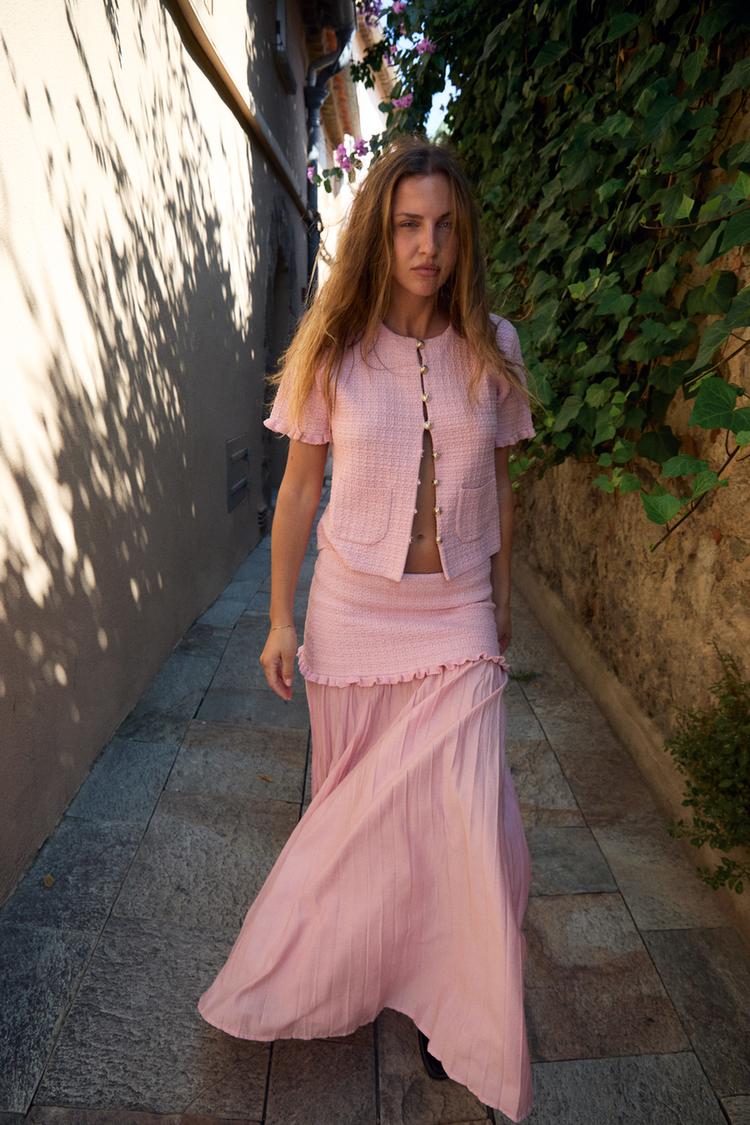 JUPE EN MAILLE EN MATIÈRES VARIÉES